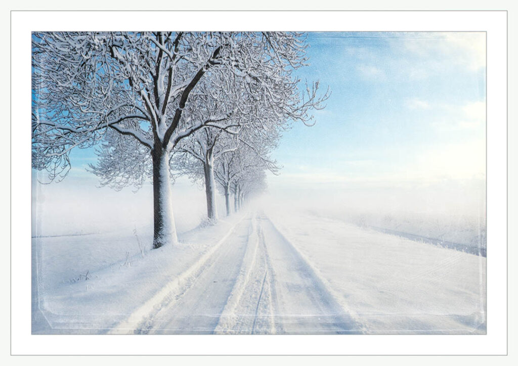 Fineartprint of the snow-covered Feldstegel Road.